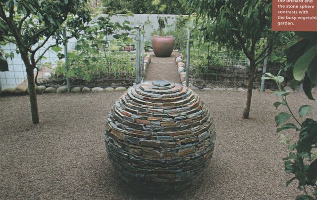 Stone sphere in garden